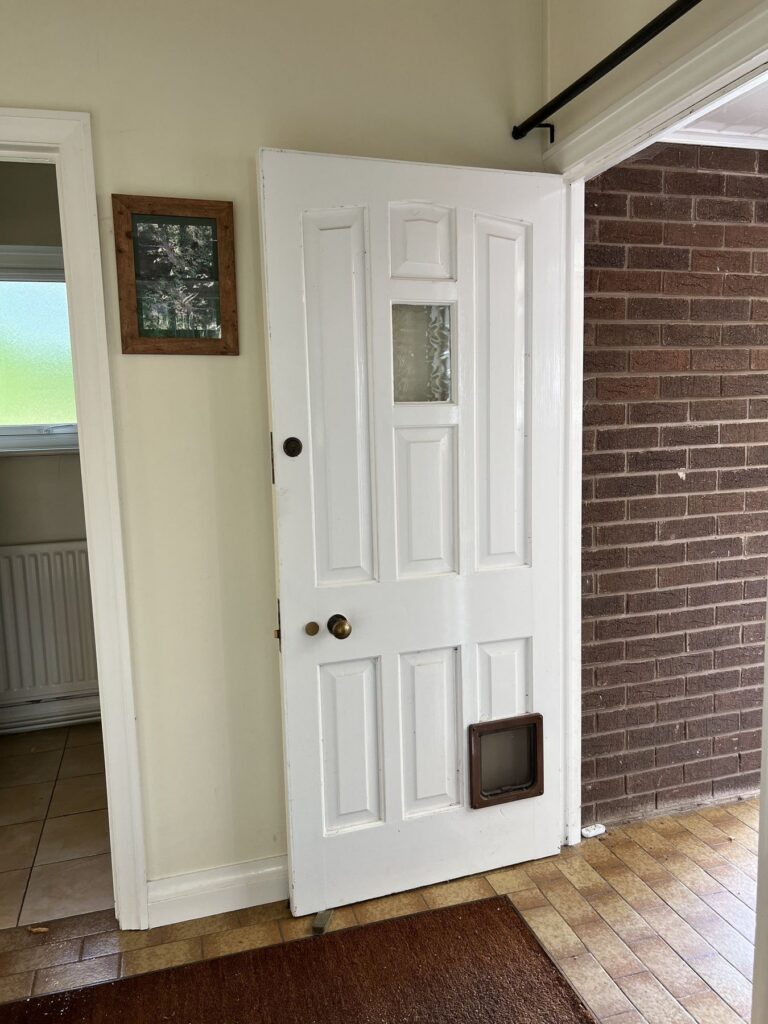The original panelled back door before it was replaced