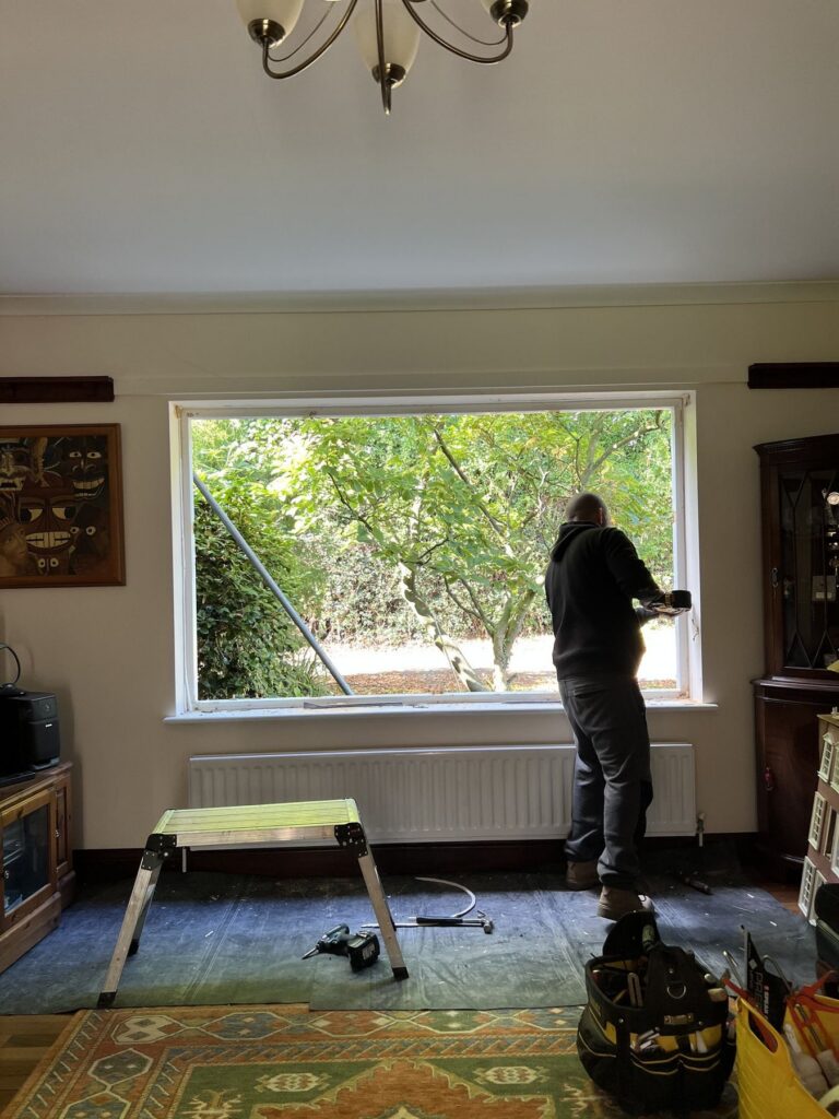Window opening stripped back and prepared for the new frame